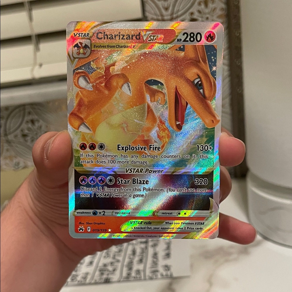 Pokemon Charizard VSTAR Trading Card - Orange and Silver
